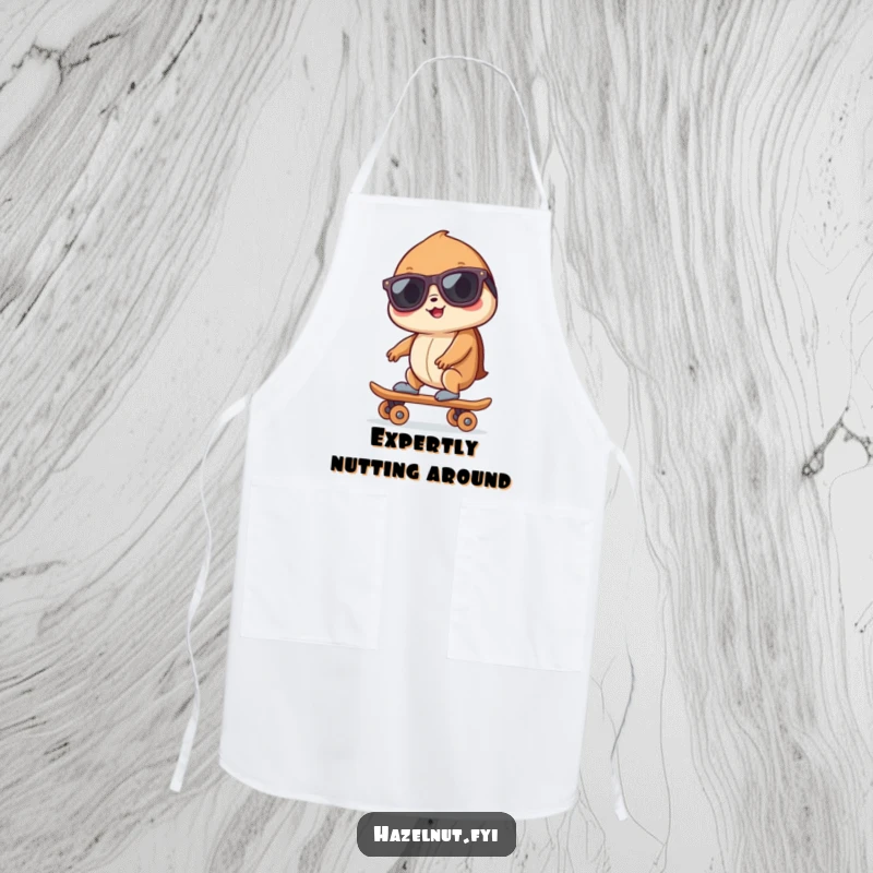 Funny hazelnut wearing sunglasses, riding a tiny skateboard, depicted on a chef's apron, adding humor to cooking and baking activities.