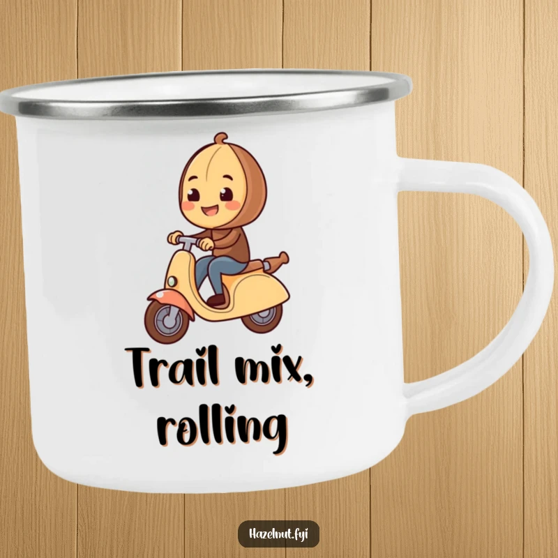 Funny Hazelnut Camping Mug shows a hazelnut riding a rolling pin scooter, ready for the great outdoors with a smile.