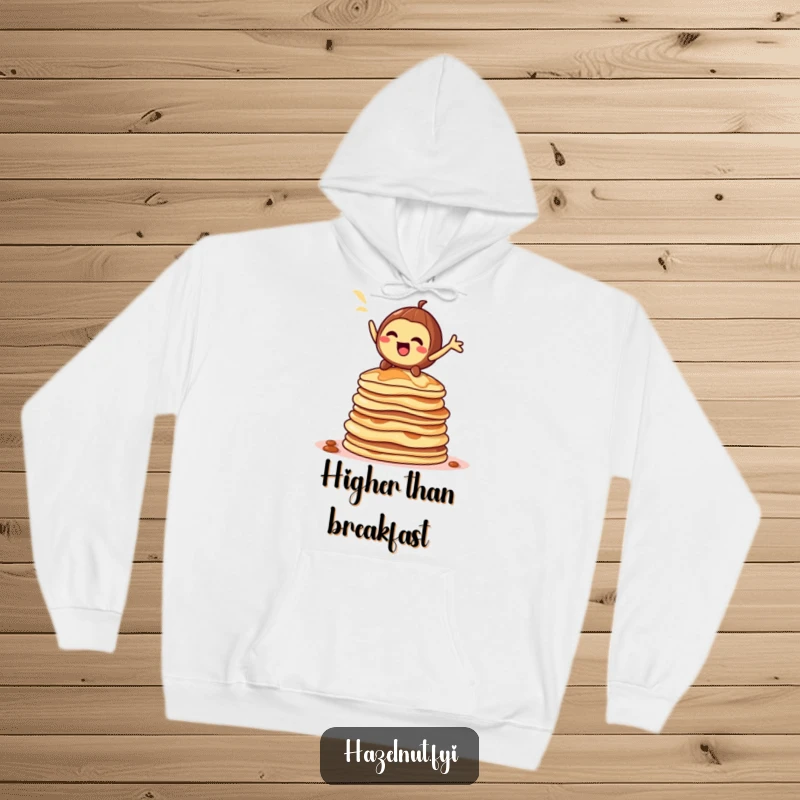 Funny hazelnut character hoodie, striking a dramatic pose on a towering stack of pancakes, warm and humorous loungewear.