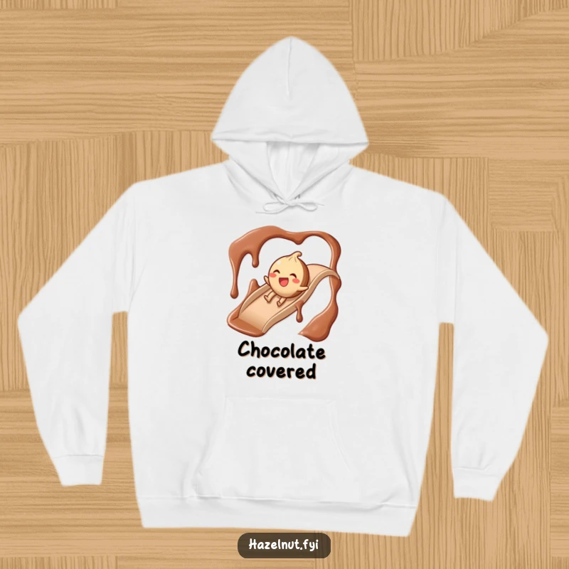 Funny Chocolate Slide Hazelnut Hoodie, a giggling hazelnut character enjoying a slippery ride down a chocolate syrup slide.