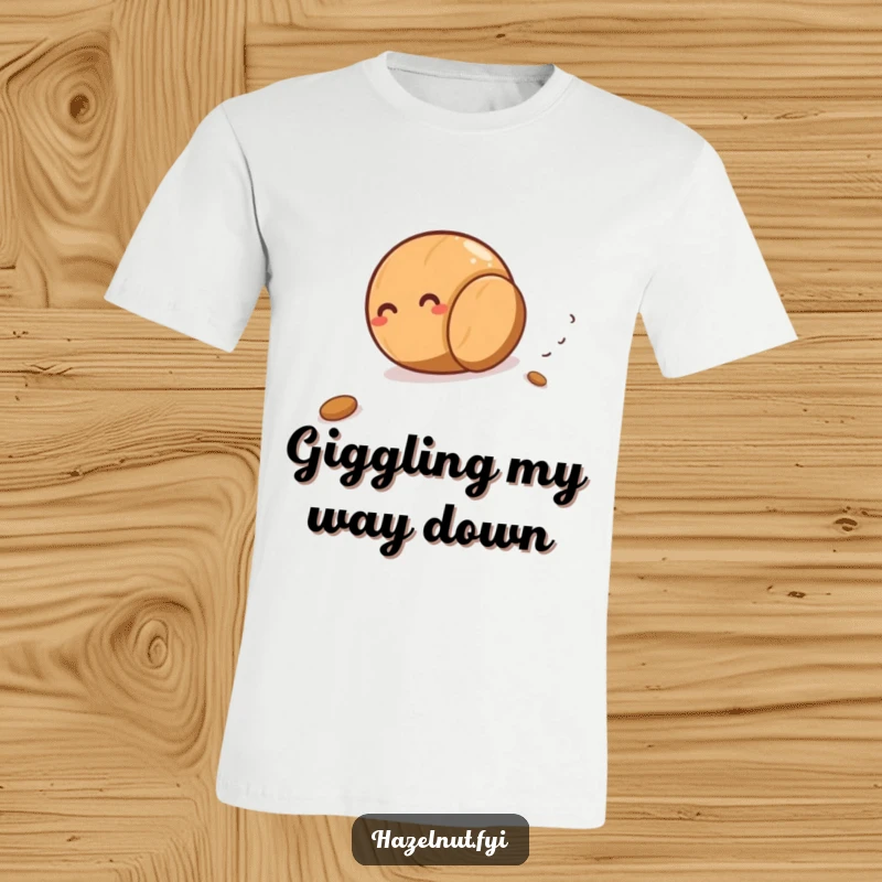 Funny, giggling hazelnut rolling downhill with glee, depicted on a comfortable t-shirt, perfect for outdoor humor.