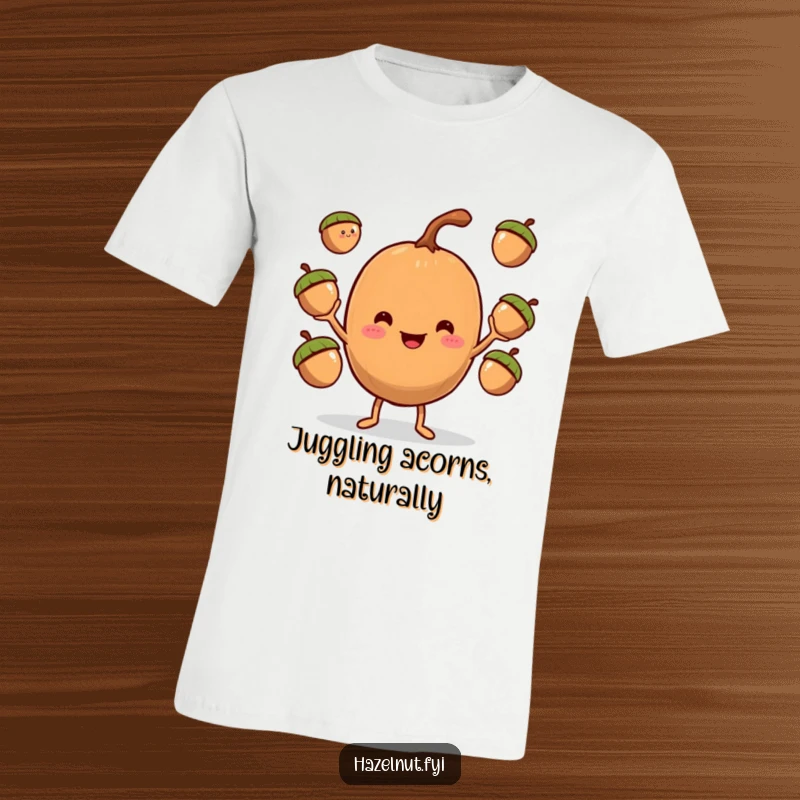 Funny Hazelnut Juggler T-Shirt, a smiling character charmingly tossing three acorns, perfect for casual wear.