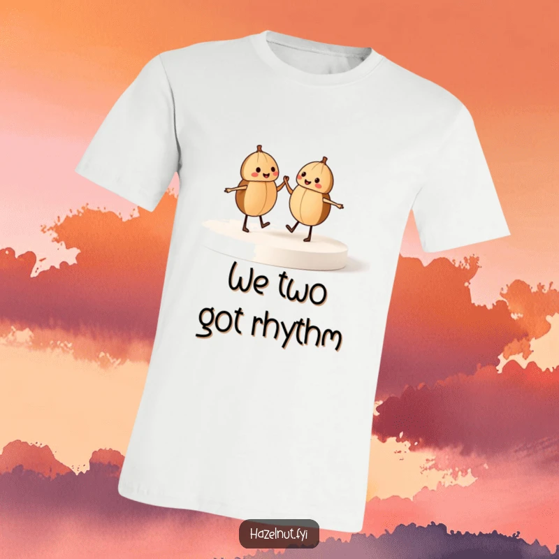 Funny t-shirt with two dancing hazelnuts holding hands on a stage, exuding happiness and a love for movement, humorous gift.