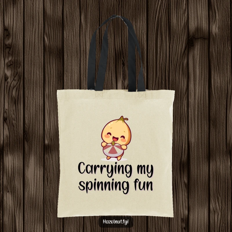 Funny Hazelnut Tote Bag showing a cute hazelnut smiling and holding a miniature spinning top, perfect for carrying happy essentials.